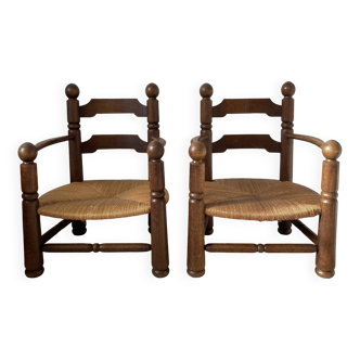 Paire de fauteuils bas style Dudouyt