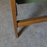 Bed with green metal braces 1960 a person foldable