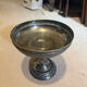 Vintage coupe on a patinated silver-plated metal stand.