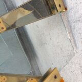 Wall shelf in gilded metal and glass/1980s