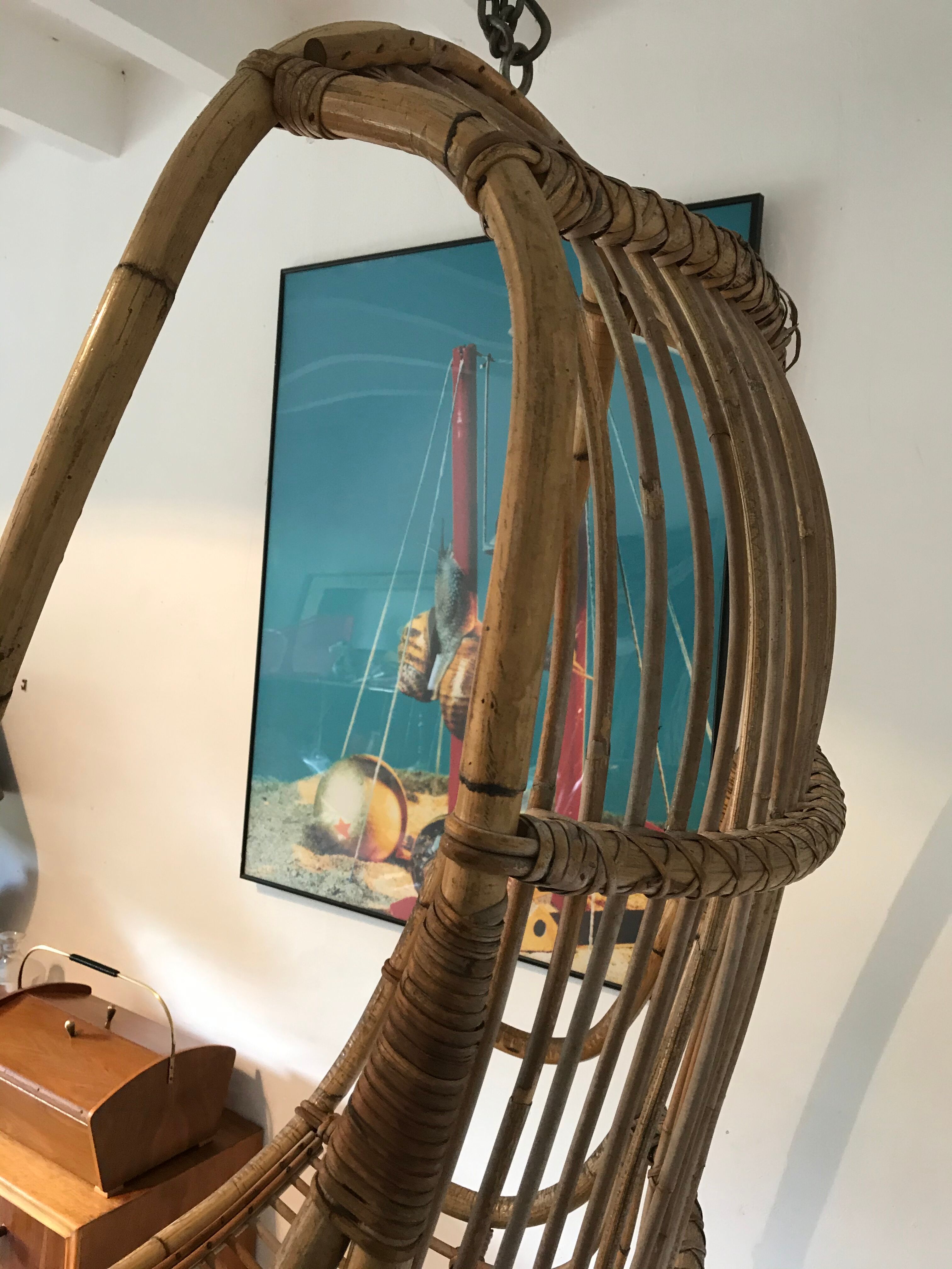 Vintage chair suspended in rattan