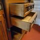 Empire style half-moon shaped mahogany bookcase with putti