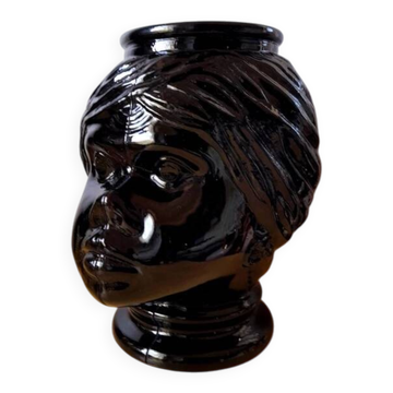 Vase or pot cover in the shape of a Moor's head made of glass from the 1970s.