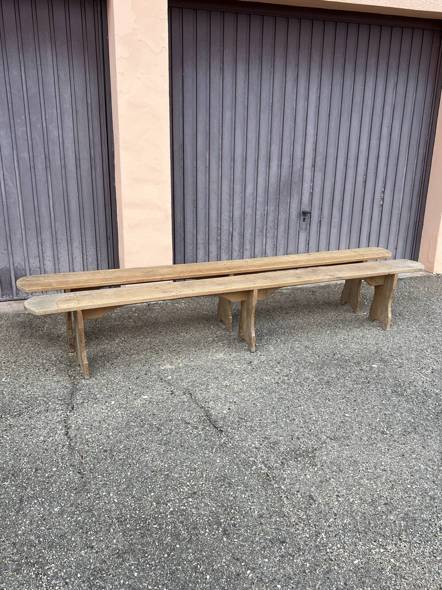 Pair of long benches in natural solid wood, French artisanal craftsmanship.