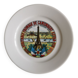 Assiette publicitaire Camembert Président. Porcelaine de Limoges - Apilco. Signée Yves Deshoulières.