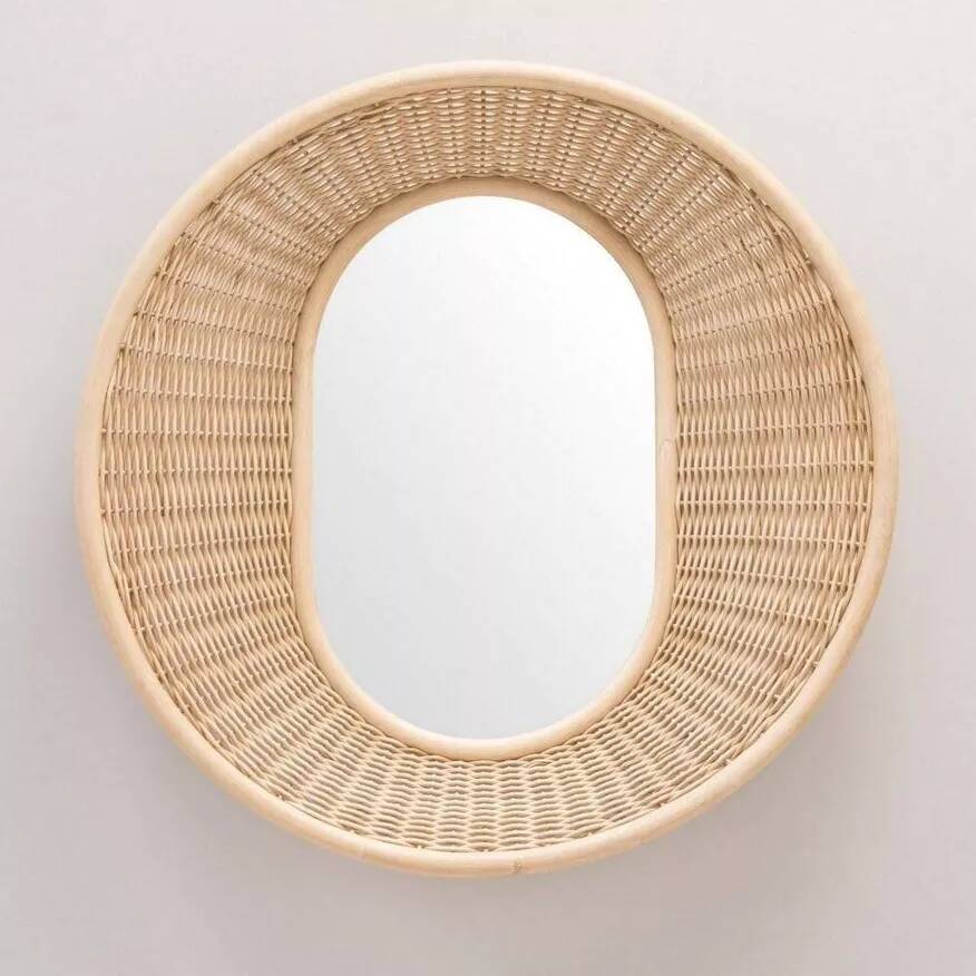 Large concave mirror in woven rattan
