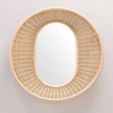 Large concave mirror in woven rattan