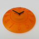 Guzzini orange wall clock from the 1980s