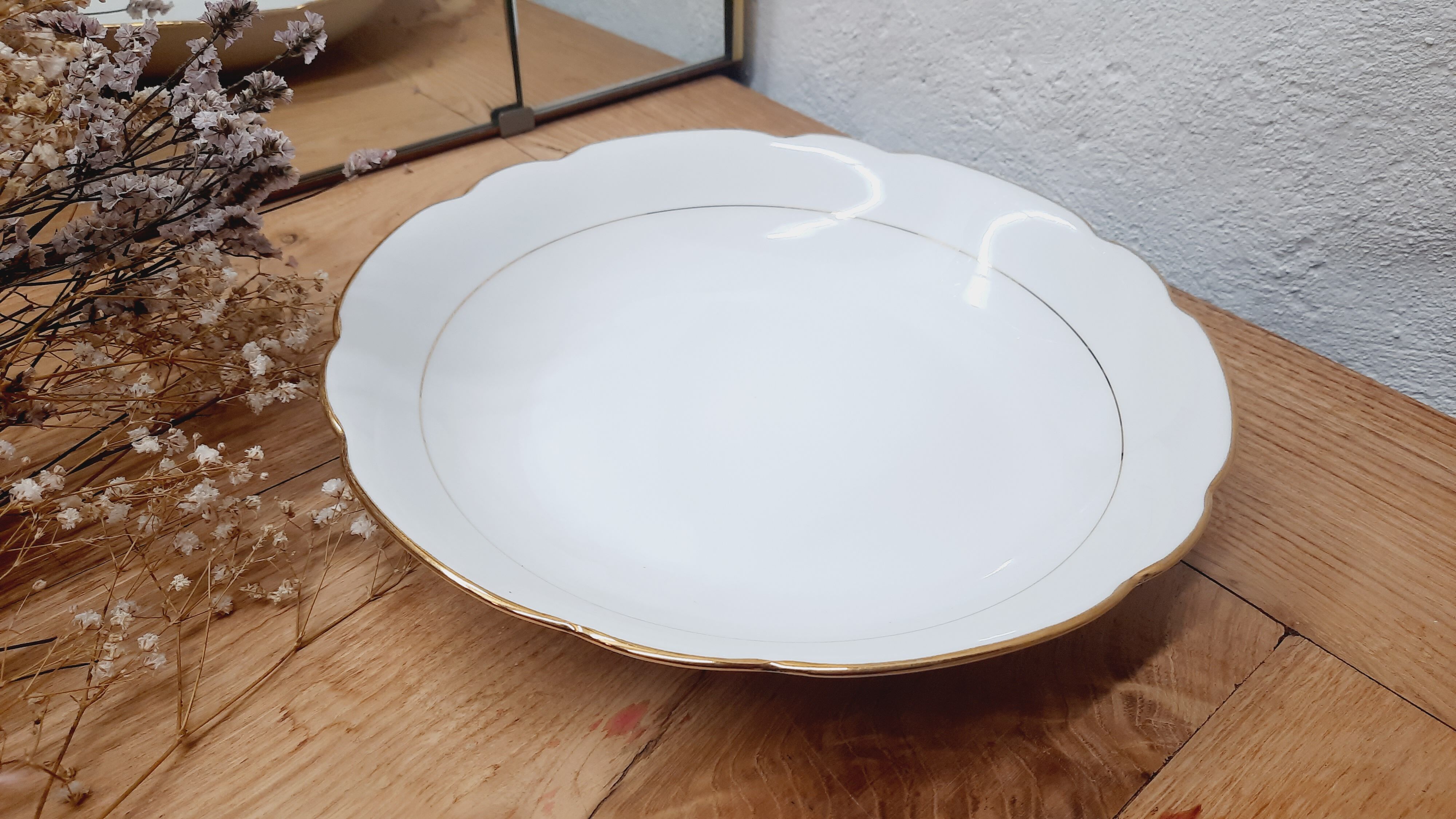 White and gold porcelain bowl