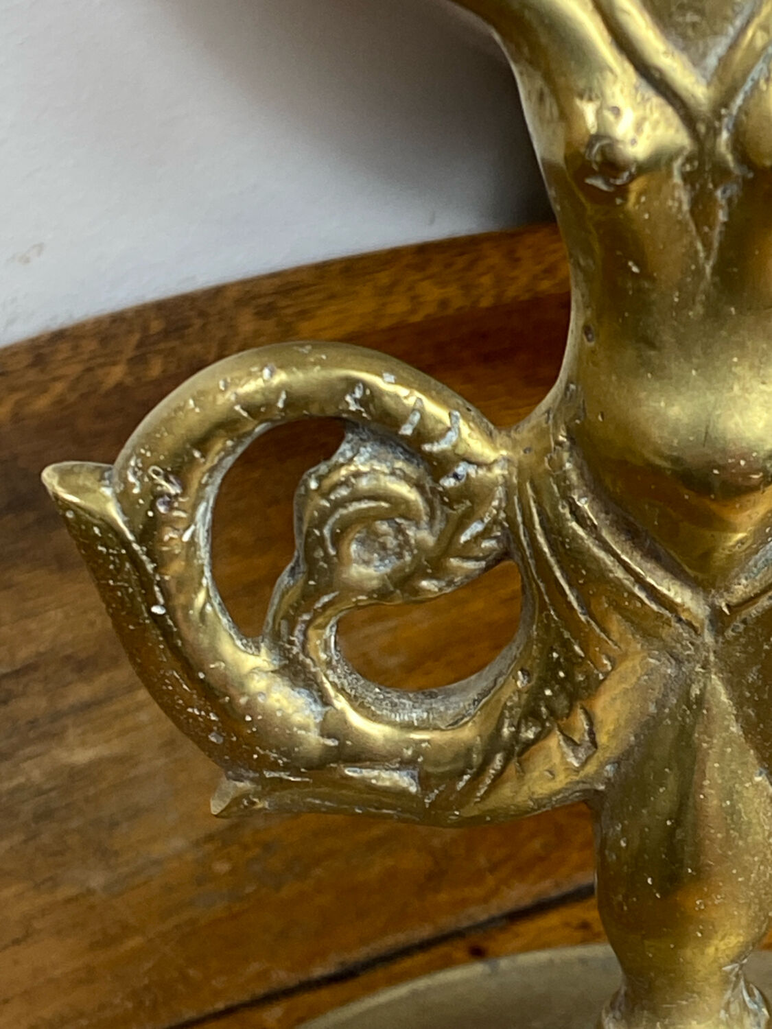 Mermaid-shaped chandelier in bronze