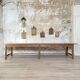 Solid wood workshop table with straight legs.