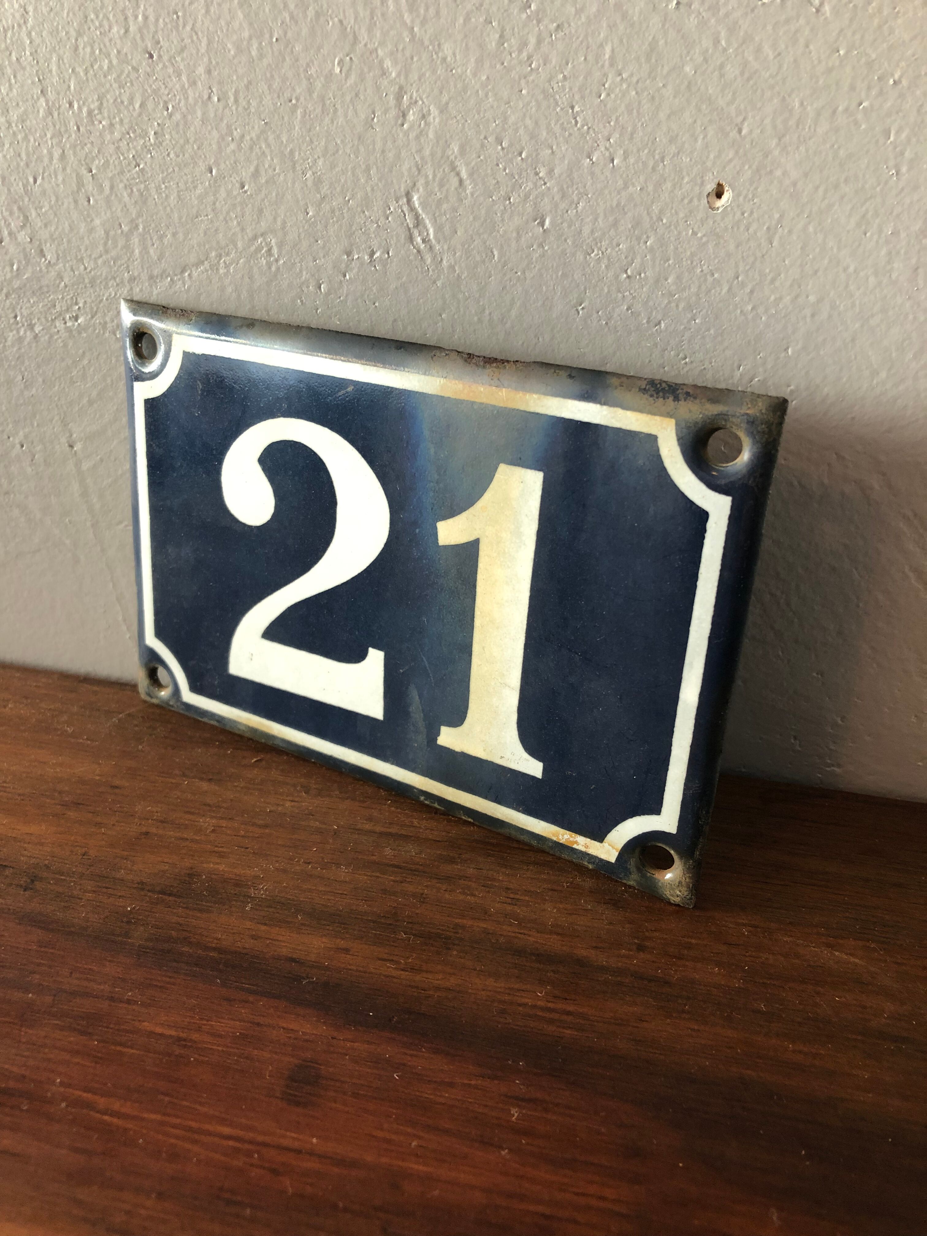 Old enamelled plate number 21