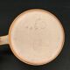 4 cups in glazed stoneware with graphic handles