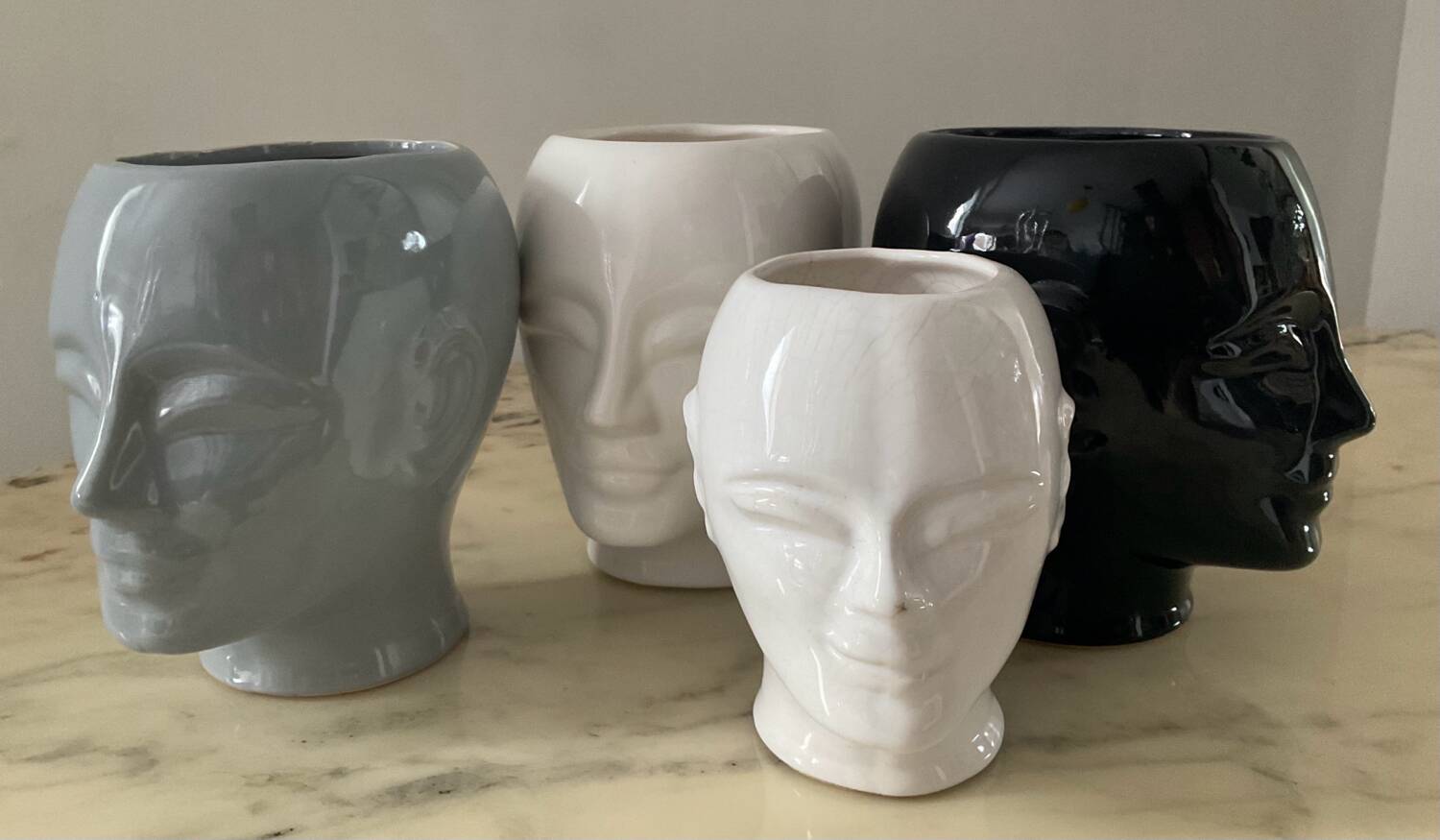 Series of 4 vintage ceramic head vases from the 70s and 80s