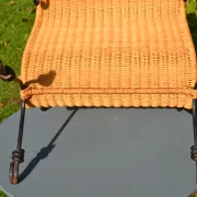Wrought iron and rattan magazine/newspaper rack