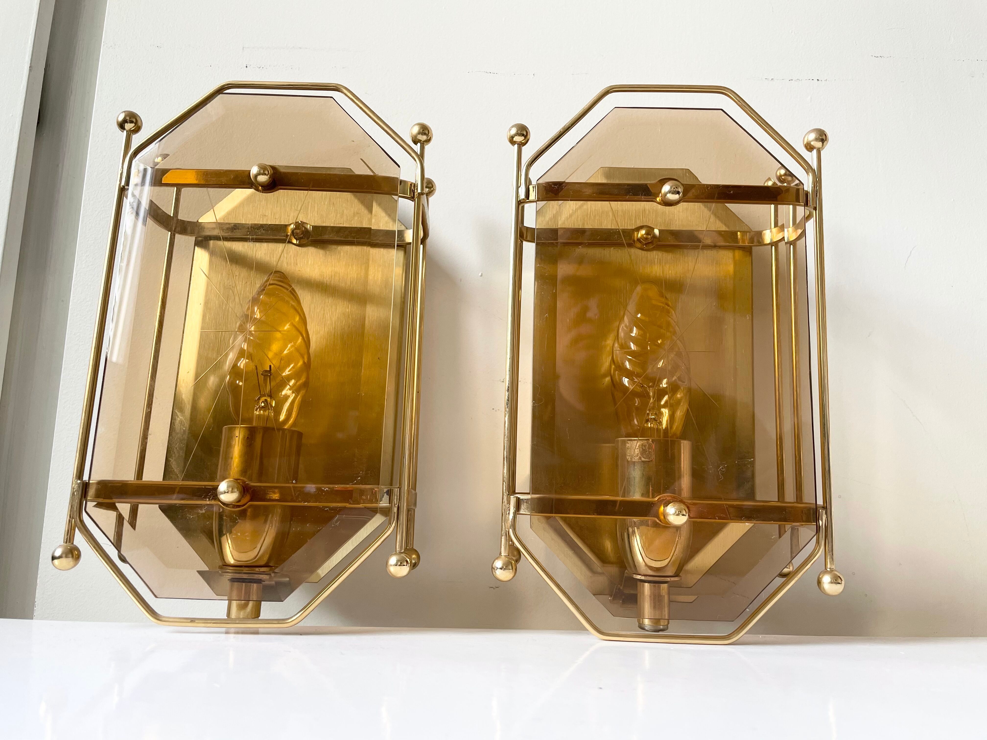 Pair of Scandinavian Vintage  wall light Sconce in Brass & Amber colored Glass