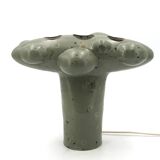 Organic sculptural accent lamp in green ceramic