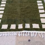 Handwoven Moroccan rug, natural wool, 250cm x 150cm, elegant decoration.