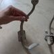 Two vintage coat hooks
