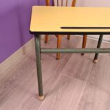 Old school desk in yellow formica