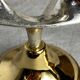 Pair of silver and gold metal candlesticks
