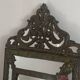 Mirror with brass repoussé frame