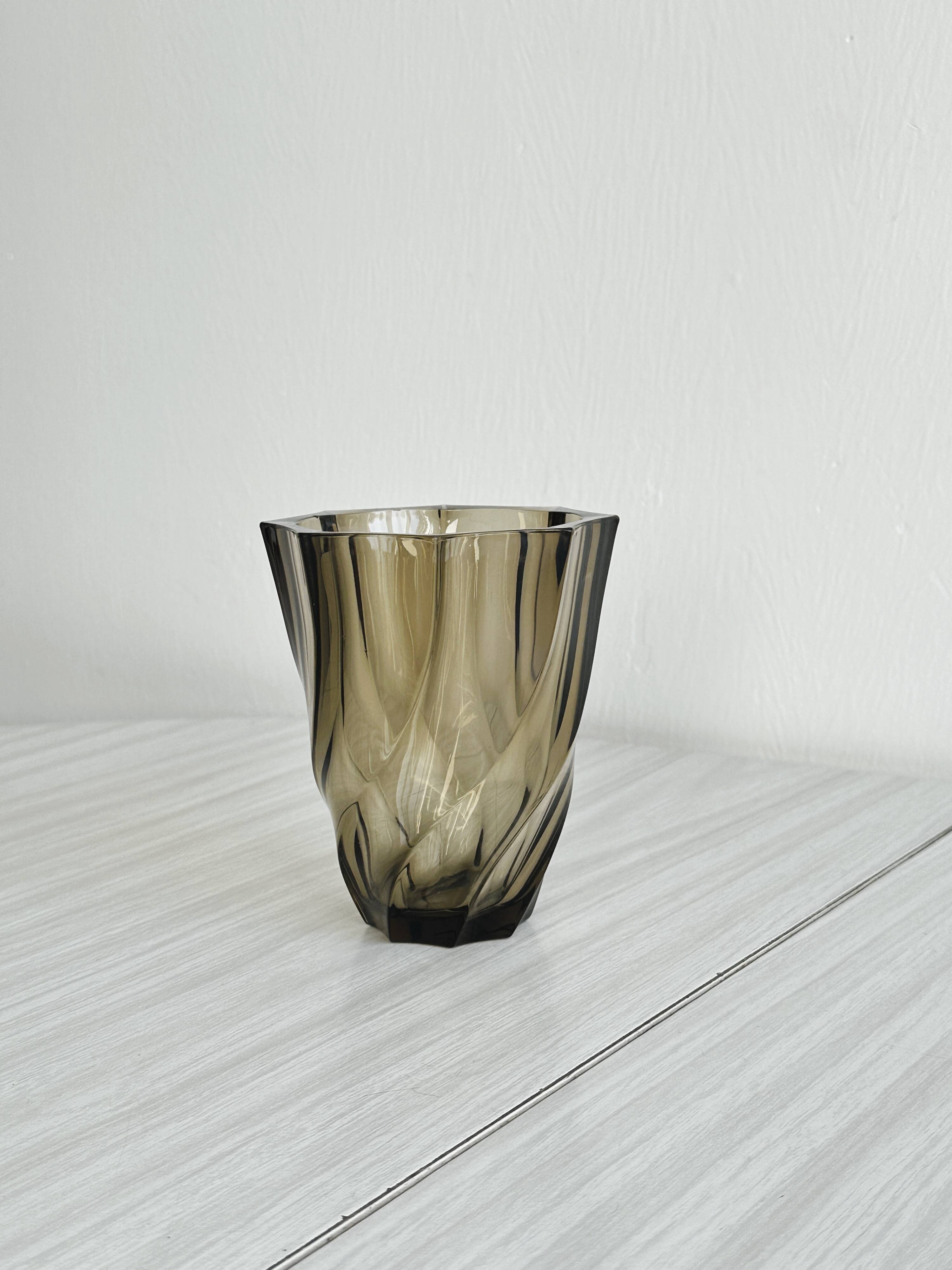 Thick smoked glass vase.