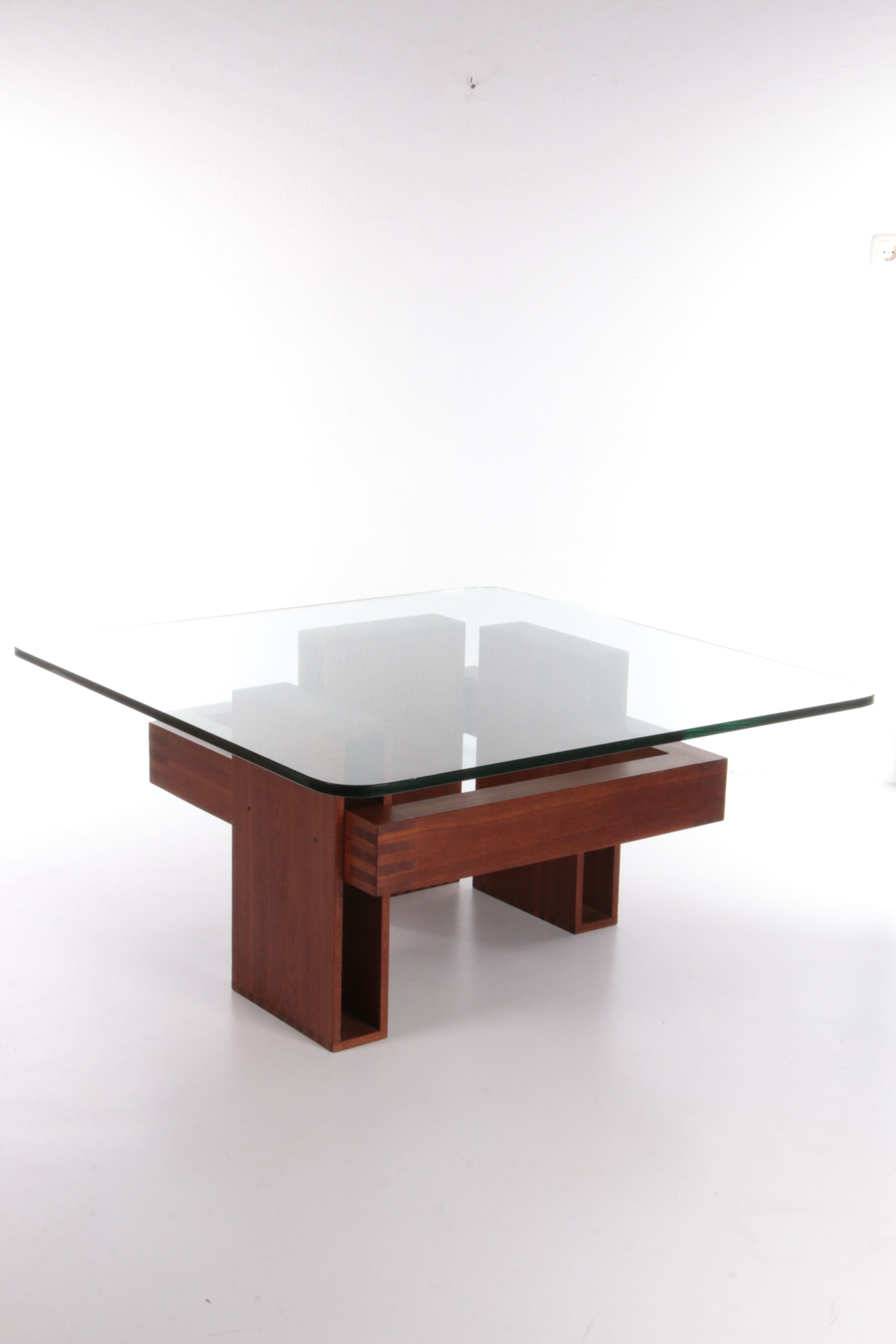 French Brutalist Design coffee table of teak with glass top, 1970