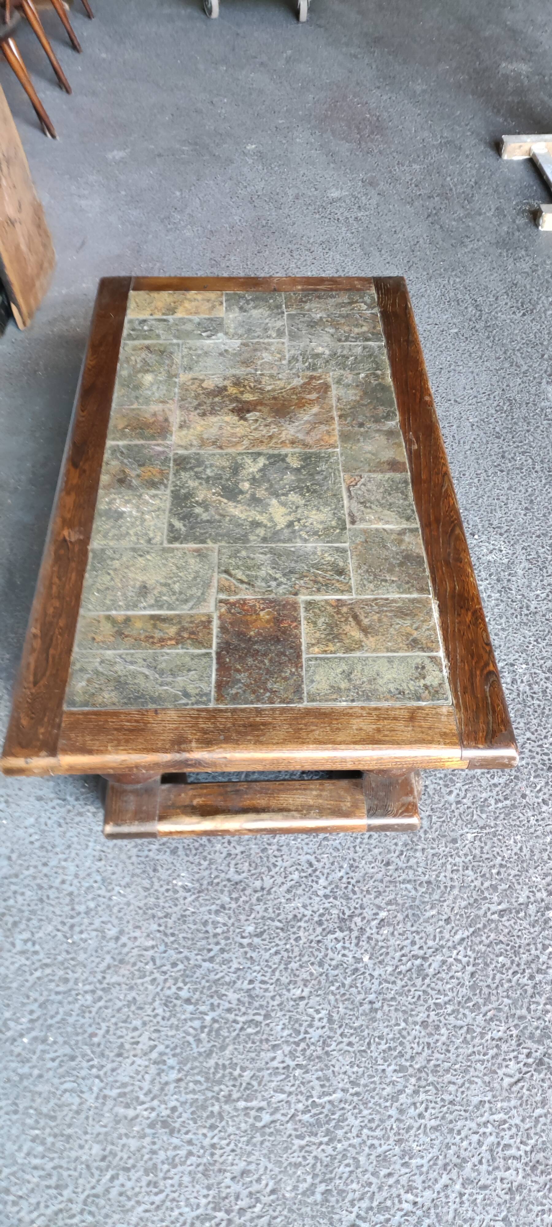 Coffee table slate top foot ball