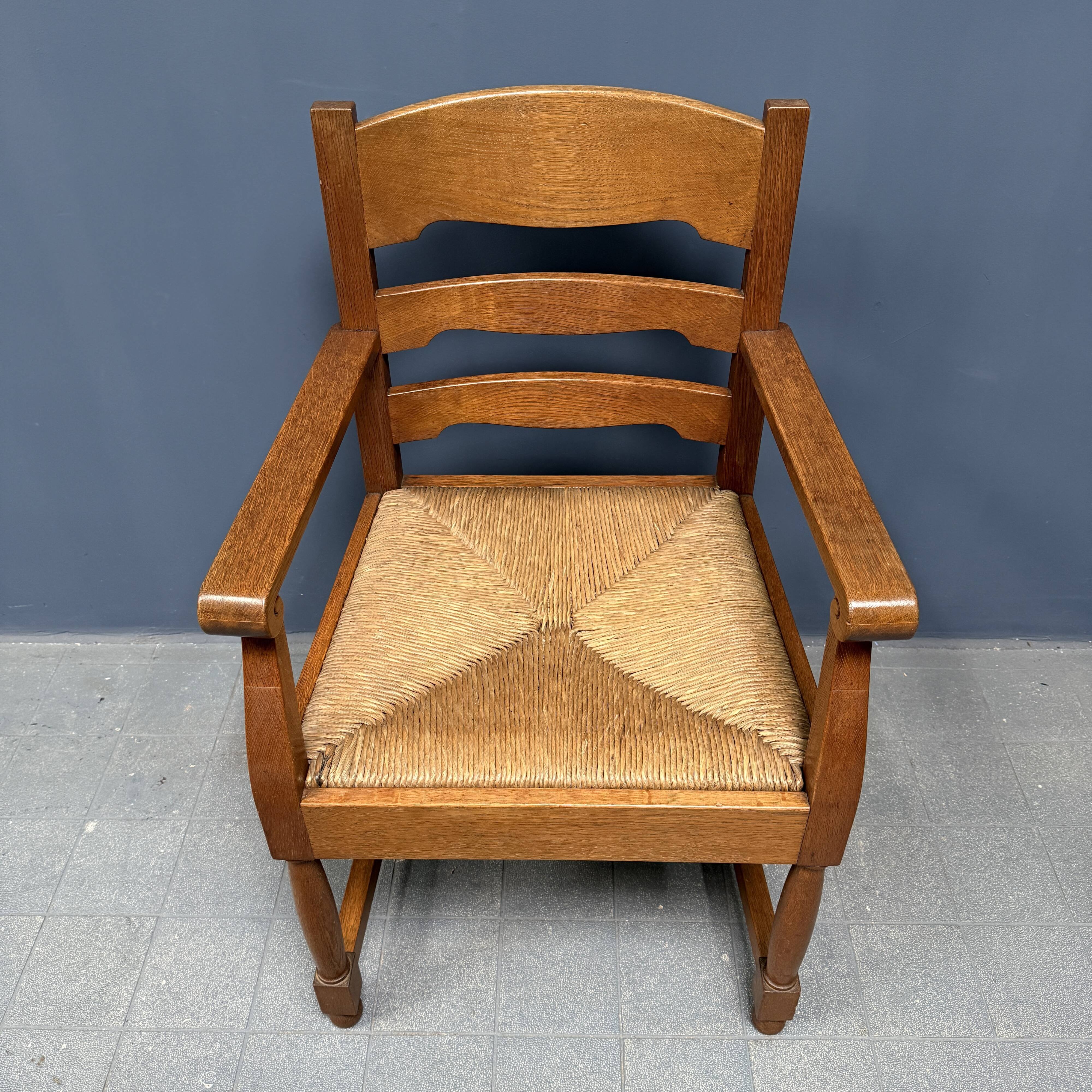 Set of two Dutch oak armchairs with rush seats