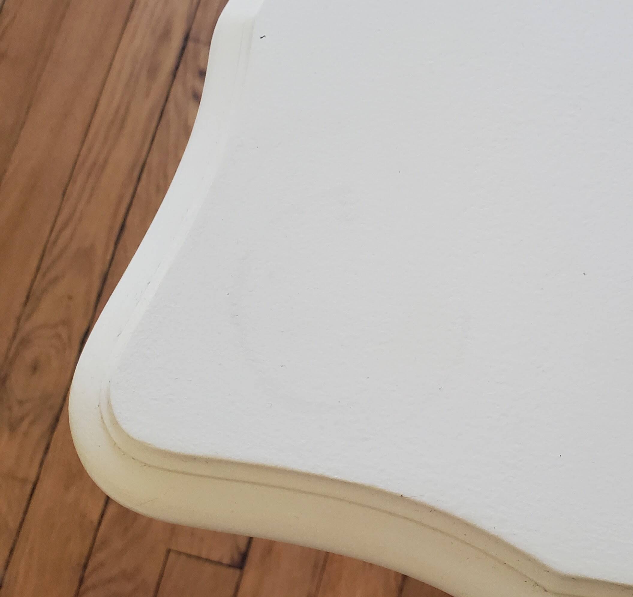 Dresser repainted in off-white and grey-pink colours.