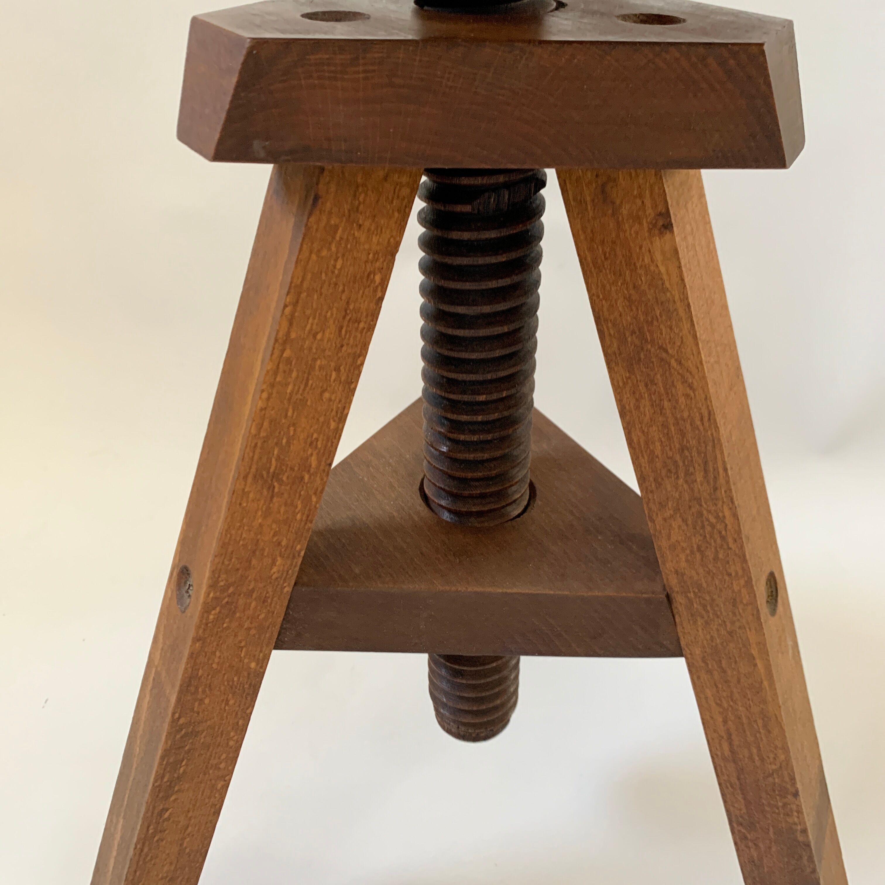 Wooden tripod stool with vintage screw