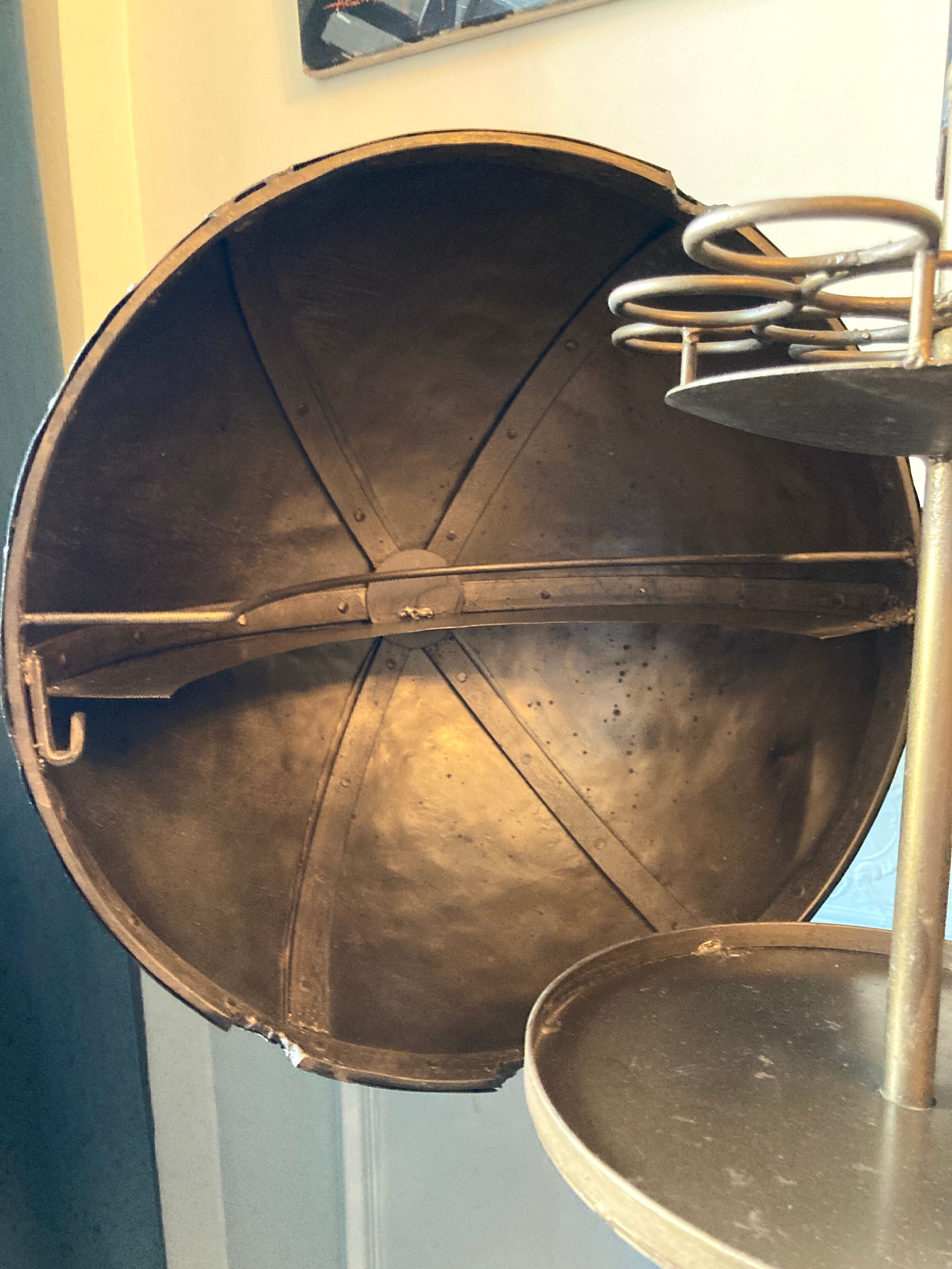 Atypical industrial furniture riveted sphere