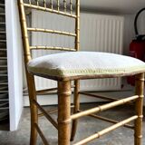 Napoleon III chair in gilded bamboo wood and beige cotton.