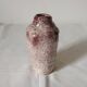 White ceramic vase with brown speckles