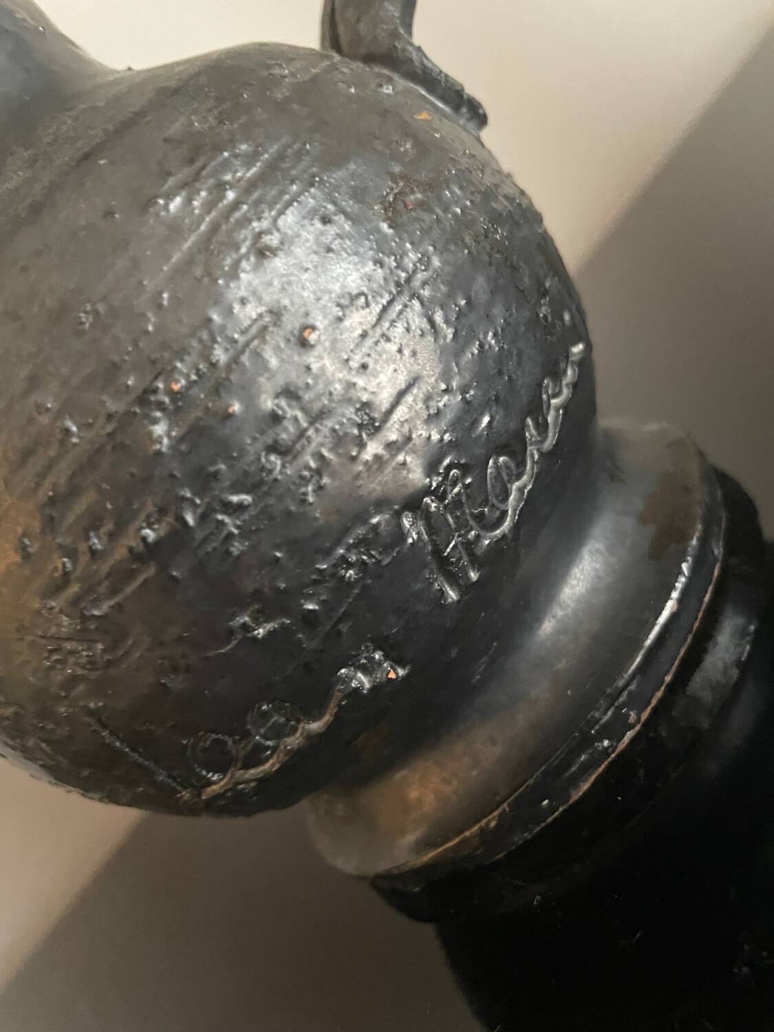 Black ceramic pitcher by Jean Marais