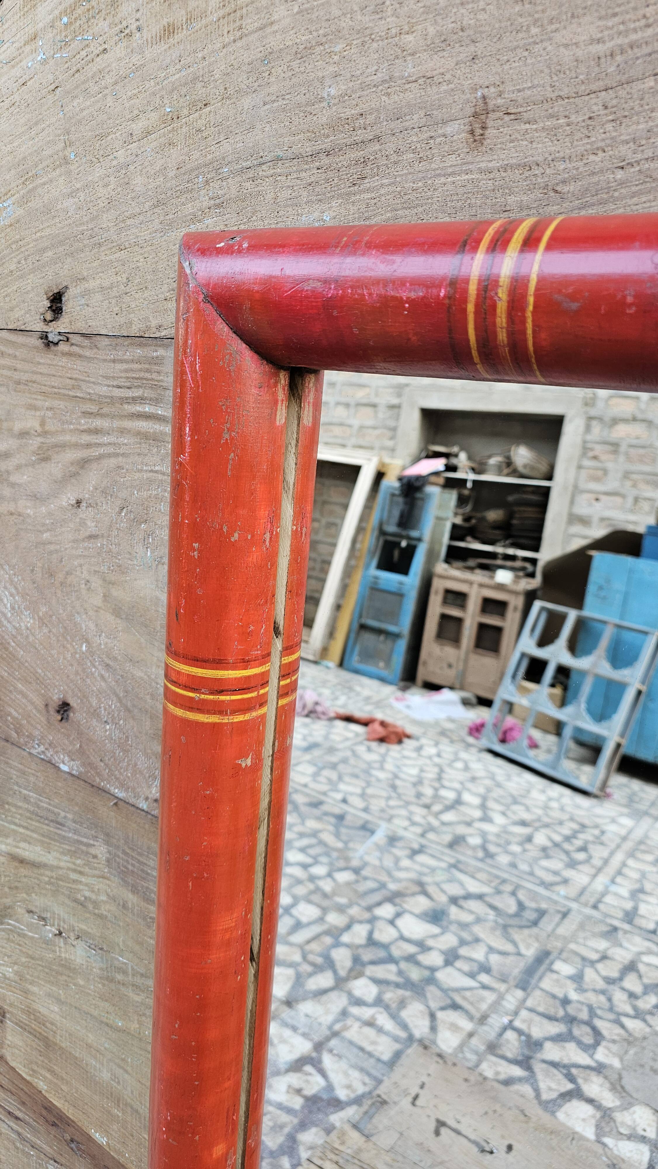 Antique mirror in Burmese teak.
