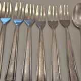 Set of silver dessert spoons and forks