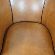 Set of 2 sheep leather club chairs finished with black piping