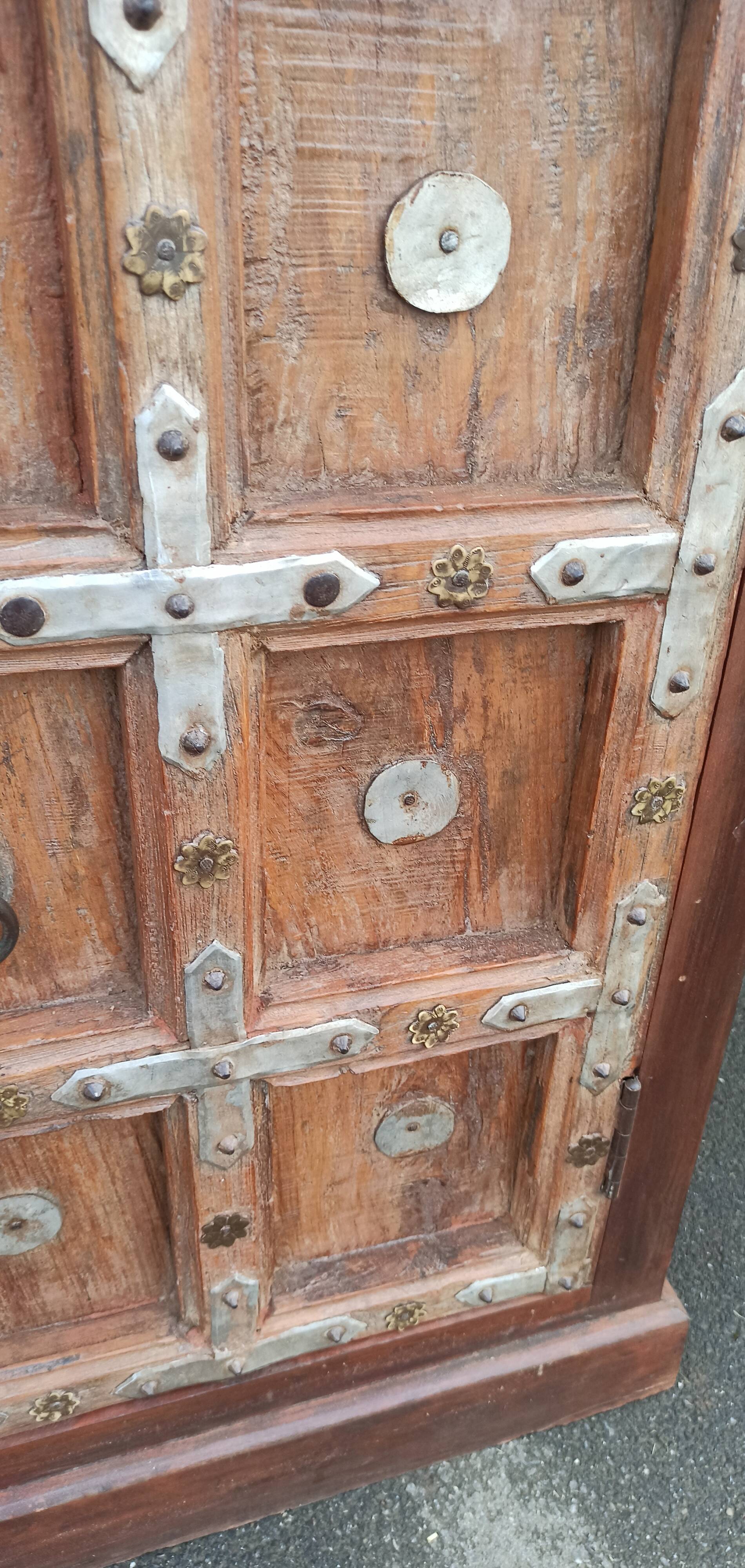 Small old wooden sideboard with two doors
