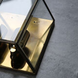 Wall sconce in brass and glass