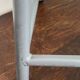 Tabouret d'atelier en métal et bois réglable en hauteur