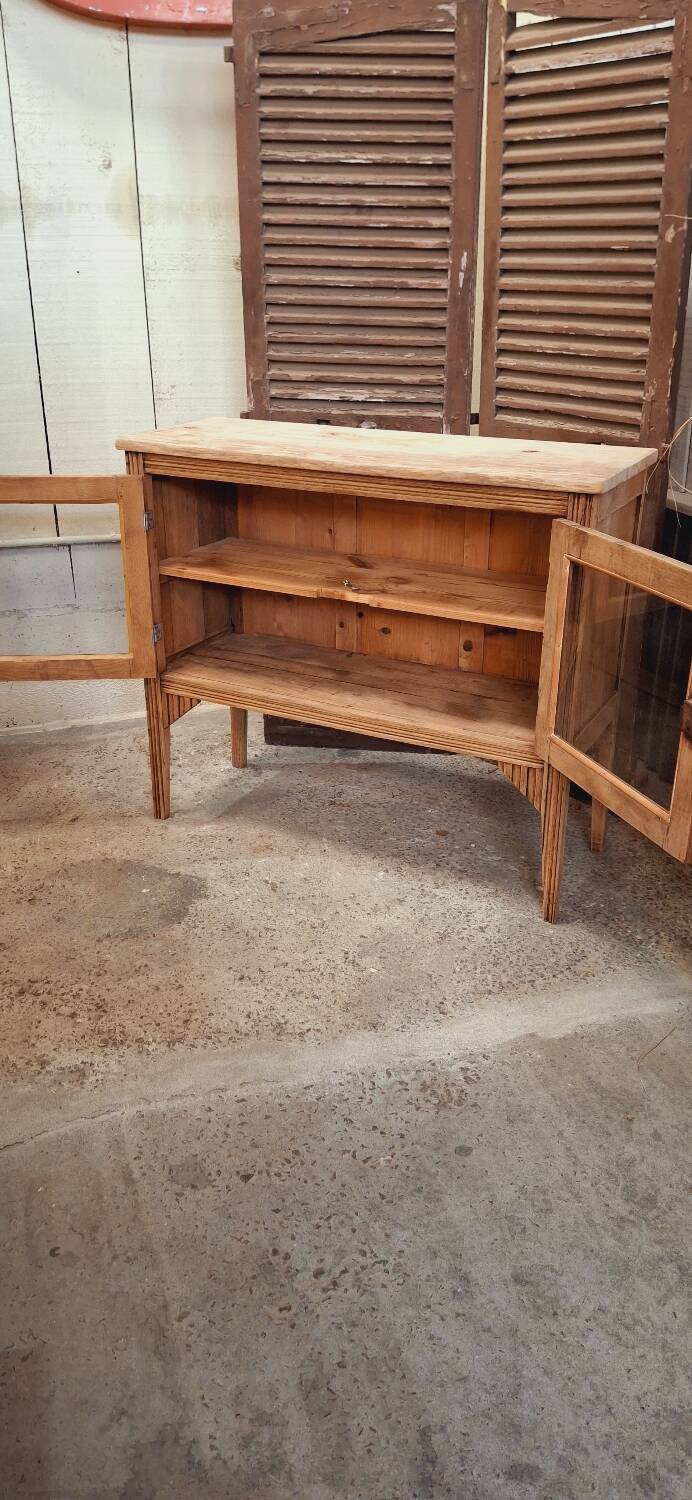 Old glass sideboard on legs