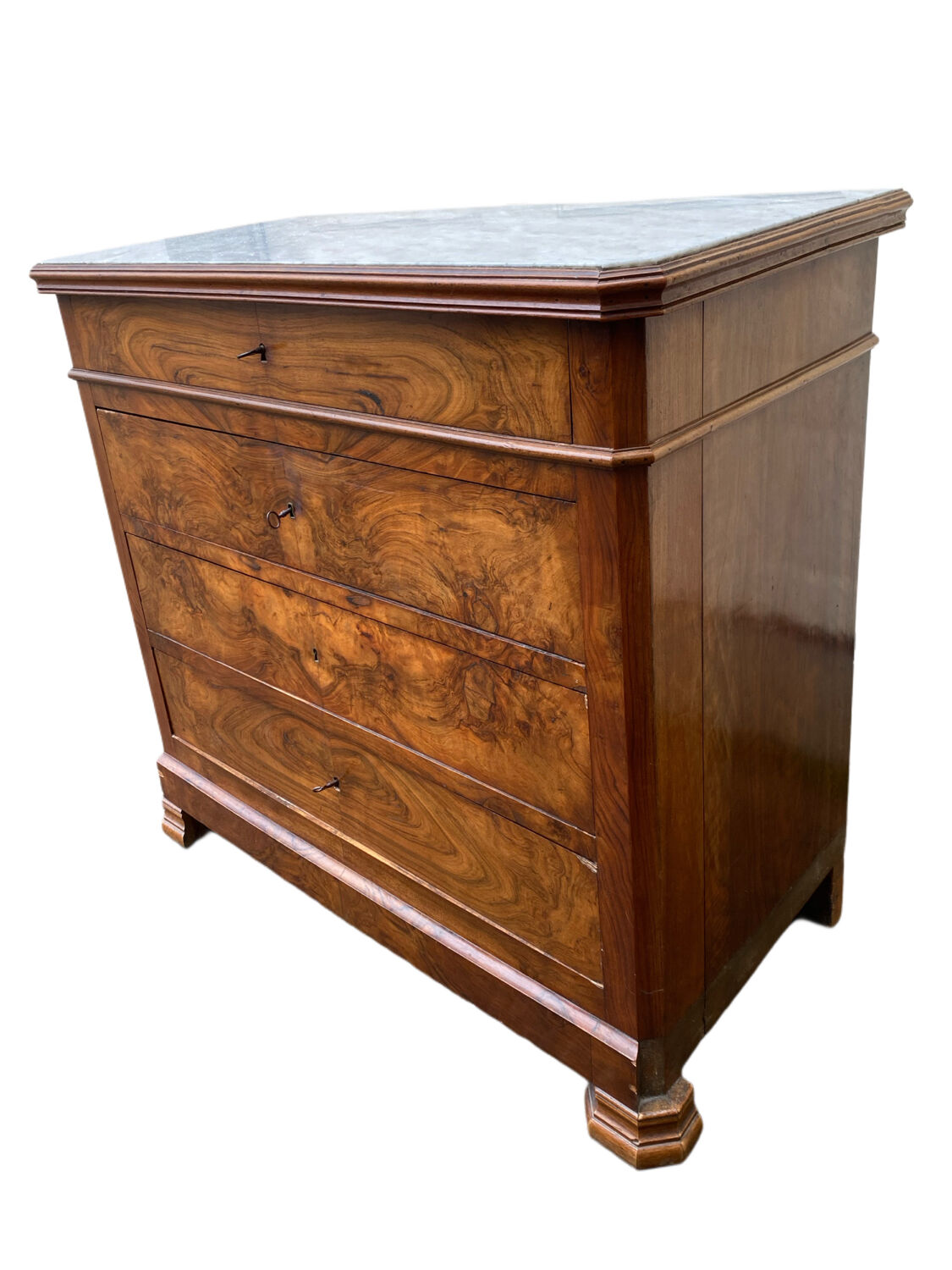 Antique Louis Philippe style chest of drawers with a white marble top.