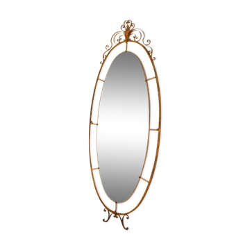 Oval mirror in art deco brass, Italy 1940s.