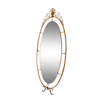 Oval mirror in art deco brass, Italy 1940s.