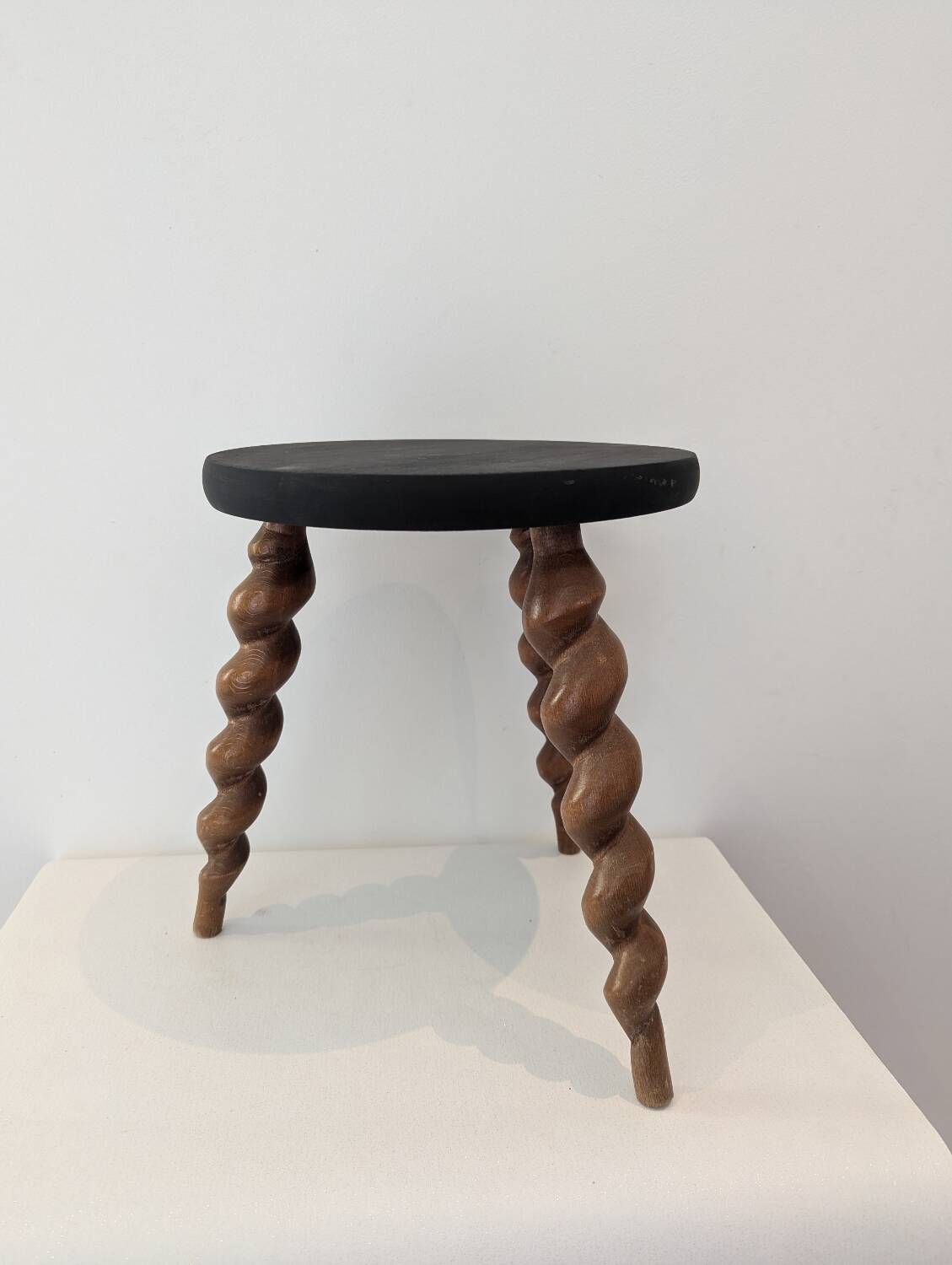 Wooden tripod stool