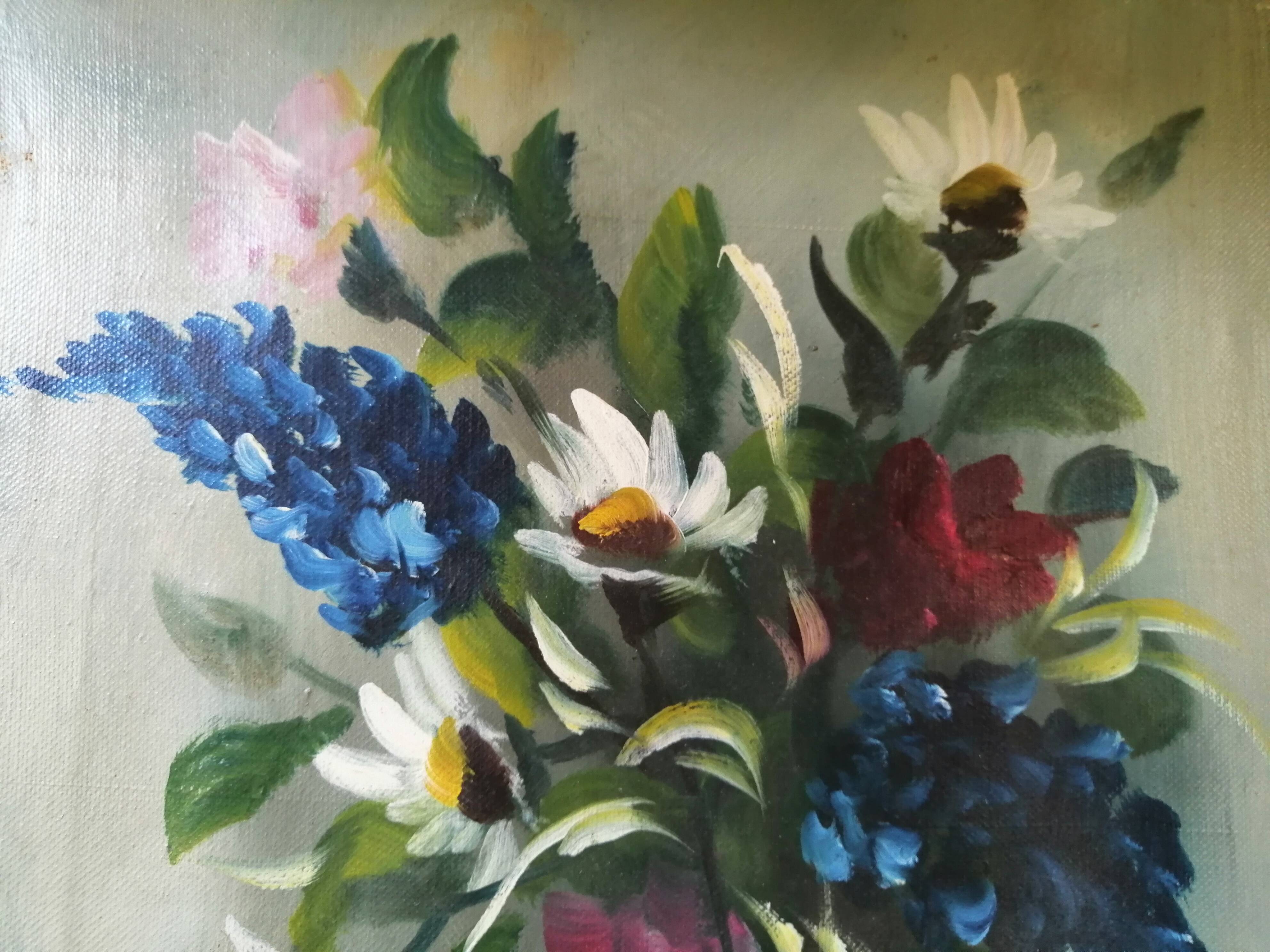 Still life with daisies and flowers in vase