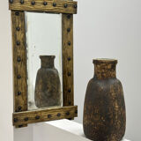 Brutalist mirror with a hammered copper and brass frame.