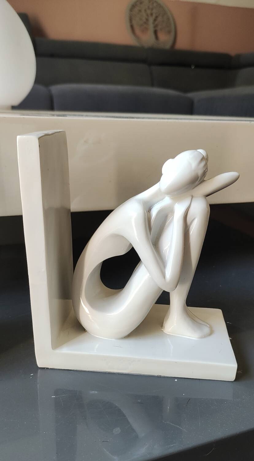 Paire de serre-livres figurines féminines